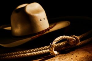 close up of cowboy hat and lasso