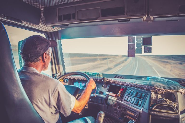 Man driving along the empty road