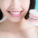 woman holding braces