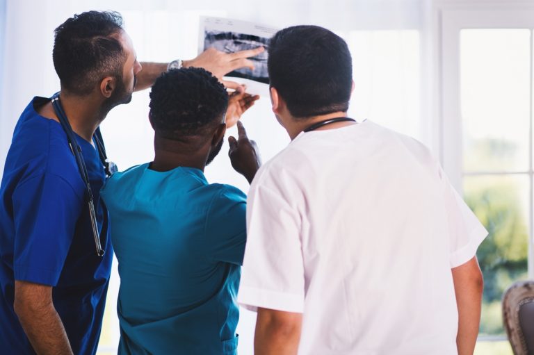 dentists looking at an xray