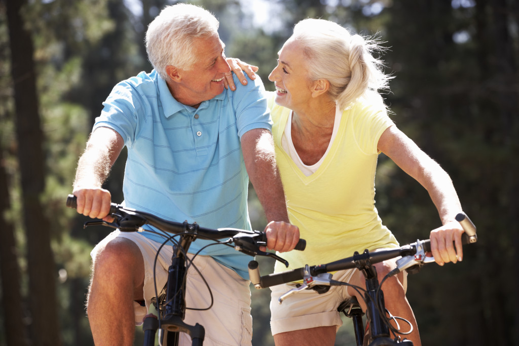retired senior citizens biking together