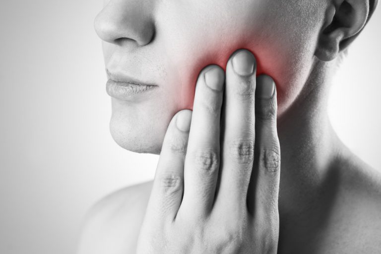 woman having sore mouth